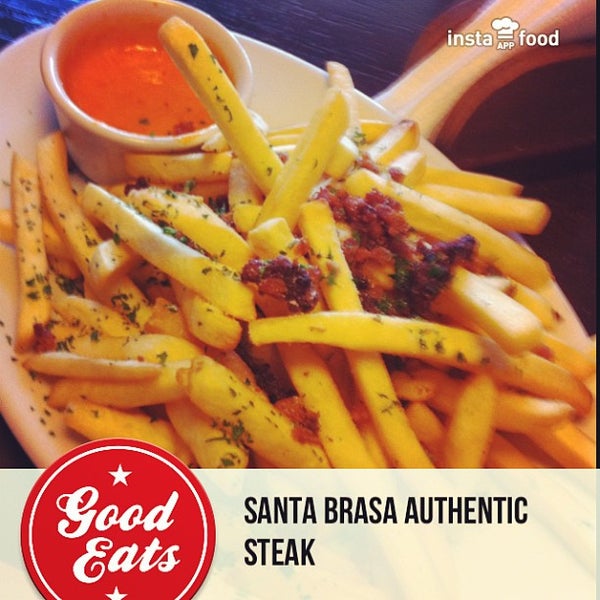 Photo taken at Santa Brasa Authentic Steaks by Nayron T. on 6/15/2013