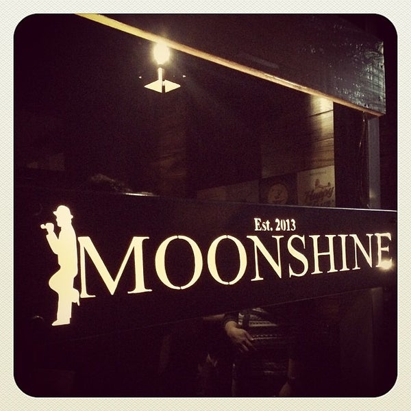 Photo taken at Moonshine Bar by Arnold A. on 3/22/2014