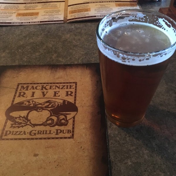 Photo taken at Mackenzie River Pizza, Grill, and Pub by Matthew S. on 12/5/2015