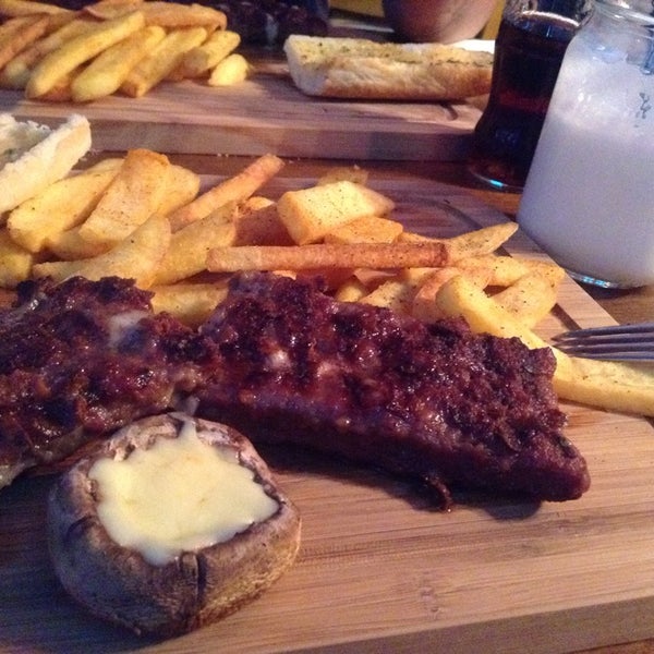 Photo taken at Flame Burger &amp; Steak House by Selvi Ç. on 10/29/2014