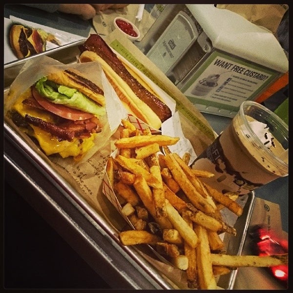 Photo taken at BurgerFi by William F. on 3/2/2014
