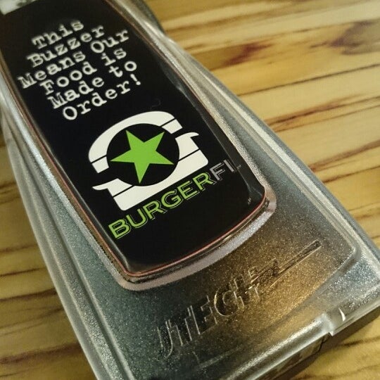 Photo taken at BurgerFi by William F. on 3/6/2014