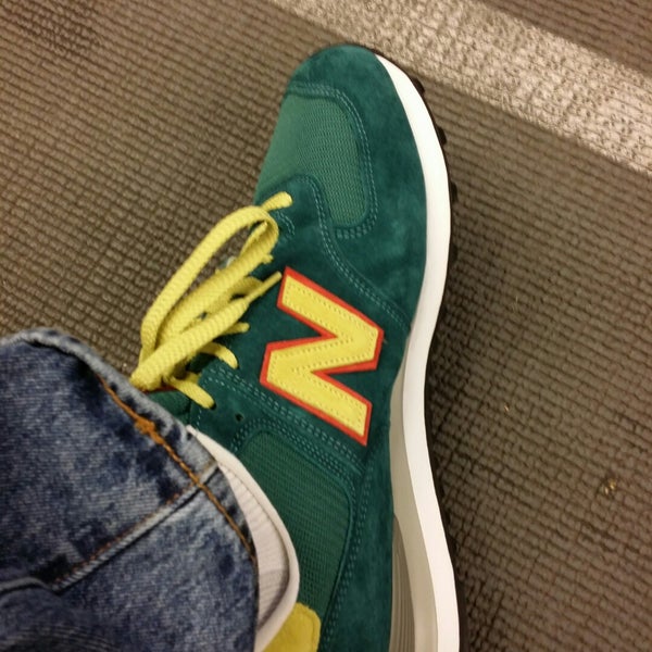 Photo taken at New Balance Flagship Store by Felix H. on 12/2/2014