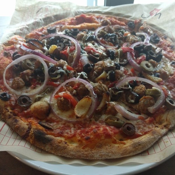 Photo taken at Mod Pizza by James on 3/30/2018