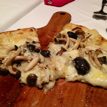 If you like mushrooms... try the Three Mushroom pizza. Portabello, Cremini and Beech Mushrooms are layered with Italian Crucolo cheese and leek fondue atop a crispy crust.
