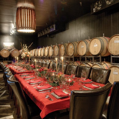 Enjoying a superb, candlelit meal in the barrel room is a perfect way to cap off the feeling of total control over a vintage, decadent product.