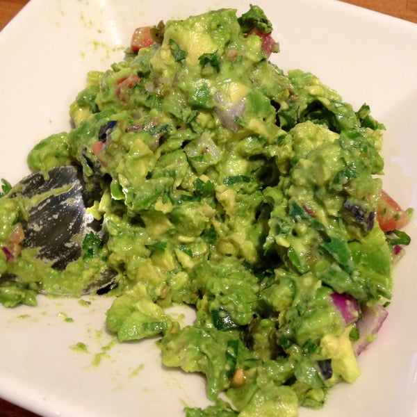 The guacamole is made at your table so you can choose what goes in it. Try it...it's delicious!