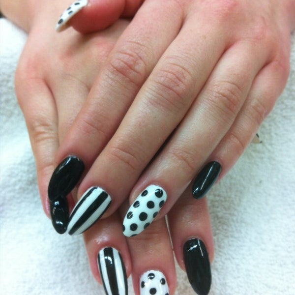 Photo taken at Yeti Nails &amp; Spa by Heather W. on 2/28/2014