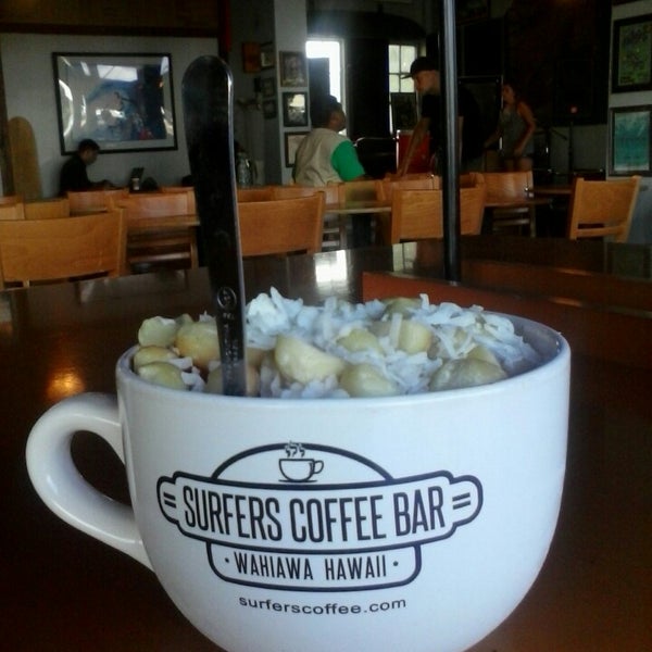 Photo taken at Surfers Coffee Bar by Erin G. on 4/6/2014