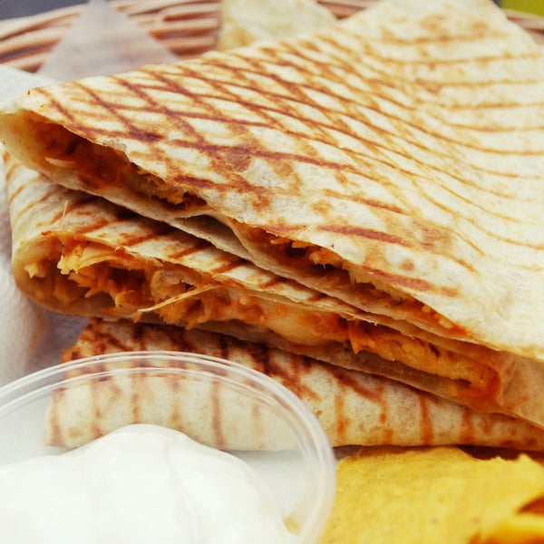 Spice up your day :) Creamy cayenne chicken quesadilla - served with side tortilla chips & sour cream!