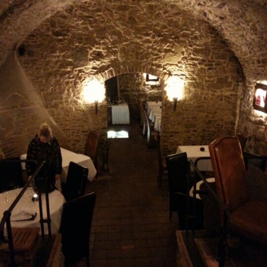 Cosy cellar from the 12th century. Very nice wine. We especially loved the gruner veltiner. Expect to pay. Ca 3500 for a coctail, the tasting menu with wine, and a calvados (last one not very good).