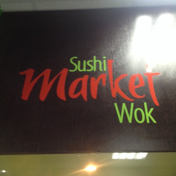 Photo taken at SushiMarketWok by Tatyana S. on 5/3/2014
