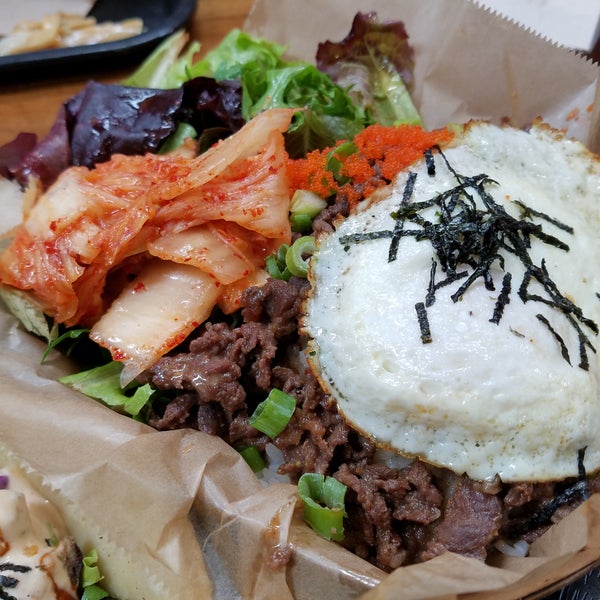 Fully customizable menu.  Got the beef bowl and zen veggie taco. All had a nice contrast of flavor,  texture, and temperature. Kim chee was just a tiny bit spicy, which was perfect for me.