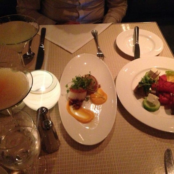 Photo taken at Gordon Ramsay at The London by Umit A. on 9/28/2014