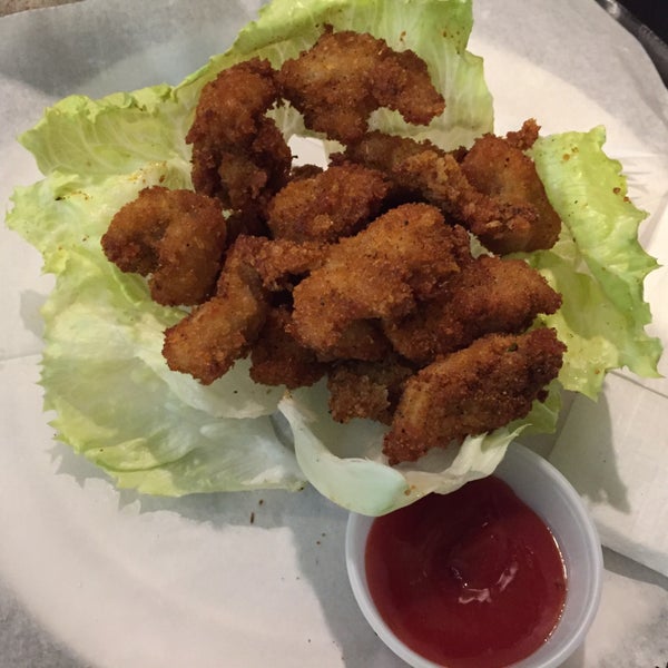 The popcorn chicken is pretty awful as the as the rest of their food offering. Head next door to Boom Boom or their sister restaurant, T-Swirl if you need a bite.