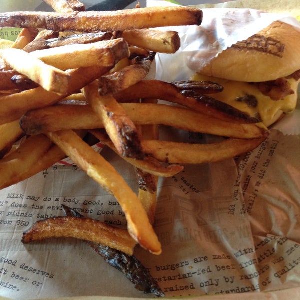 Photo taken at BurgerFi by CHRISTOPHER P. on 8/26/2014