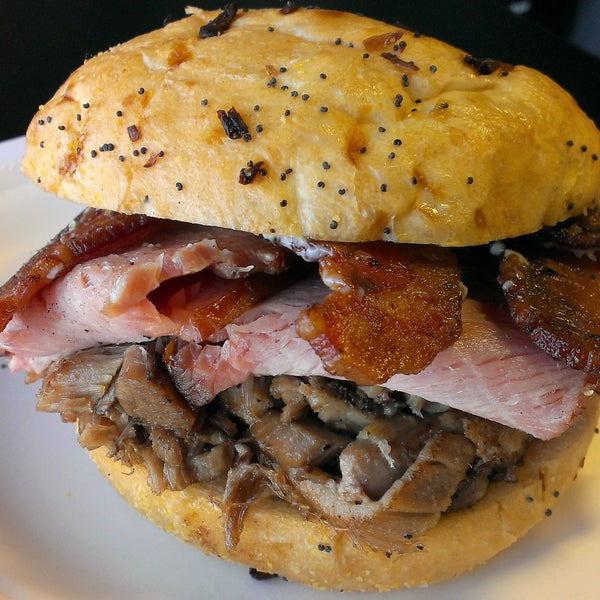 #12 THE BIG THREE - Dearborn Ham, roasted pork & applewood smoked bacon w/ mustard sauce on an onion roll