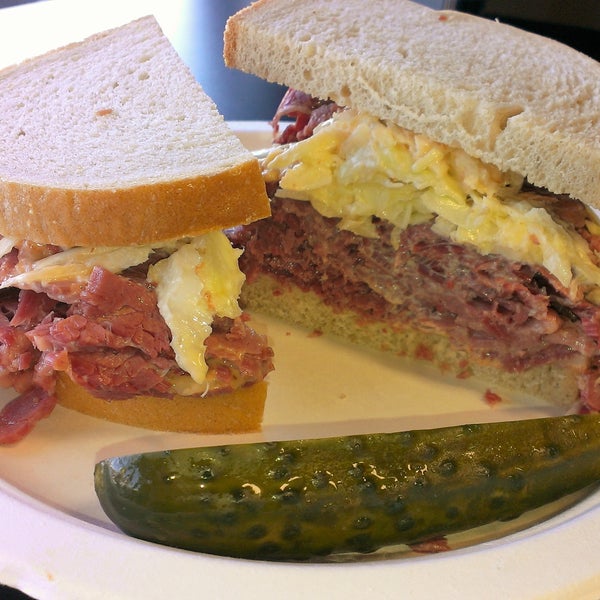 #3 Corned Beef Deluxe - House-cooked Sy Ginsberg Corned Beef, swiss cheese, russian dressing & coleslaw on deli rye