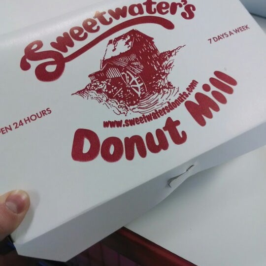 Photo taken at Sweetwater&#39;s Donut Mill by Alex W. on 3/30/2014