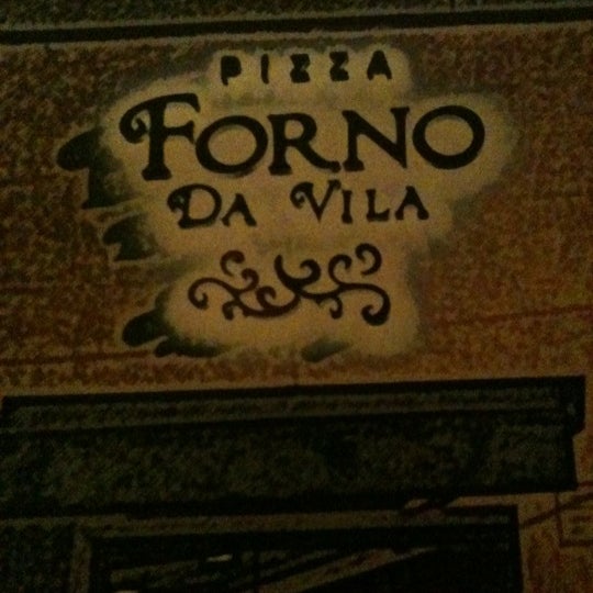 Photo taken at Forno da Vila Pizzaria by Alexandre I. on 9/29/2012