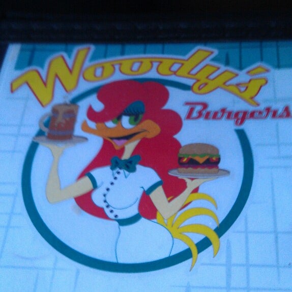 Photo taken at Woody&#39;s Burgers by Trevis T. on 1/20/2014