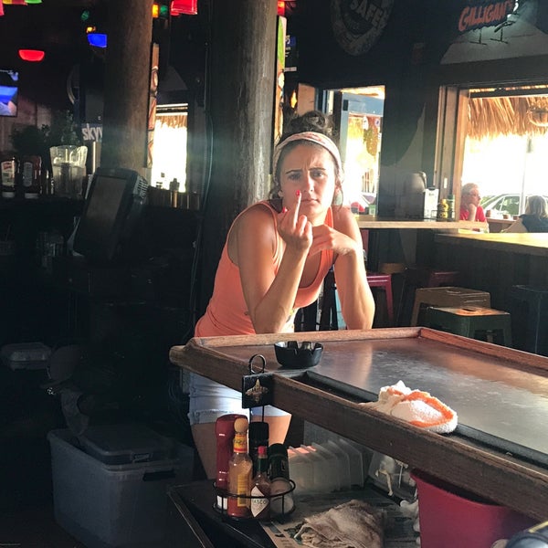 Photo taken at Gilligan&#39;s Island Bar and Grill by Korey R. on 7/28/2019