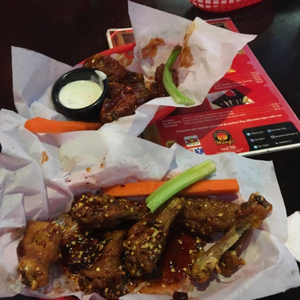 Photo taken at Pepe Pepper´s Wings by Juan Carlos S. on 12/5/2015