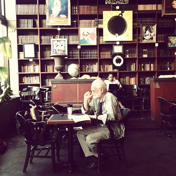 Photo taken at Bauhaus Books &amp; Coffee by James R. on 7/21/2013