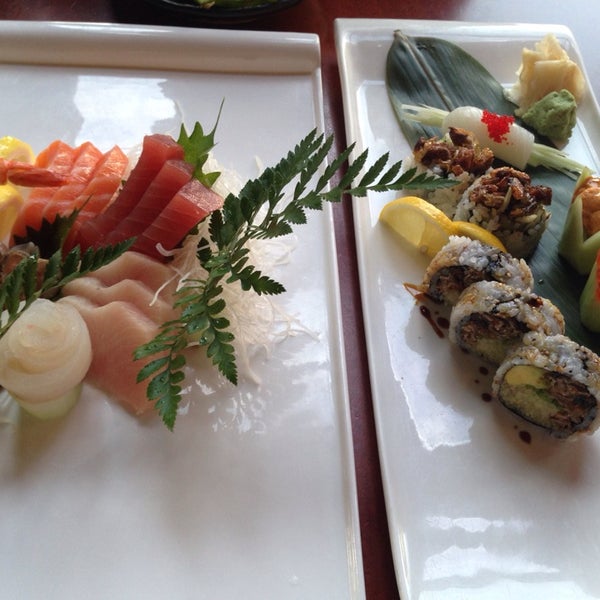 Photo taken at Kazu Japanese Restaurant by Yao L. on 6/18/2014