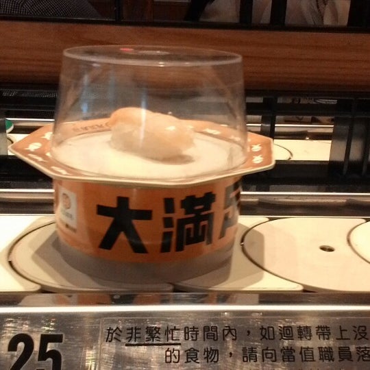 Photo taken at Genki Sushi by Shinya Y. on 10/13/2014