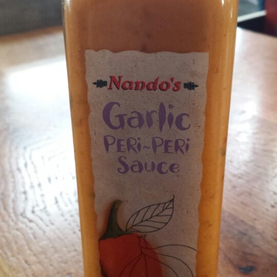 Photo taken at Nando&#39;s by Connie S. on 4/4/2014