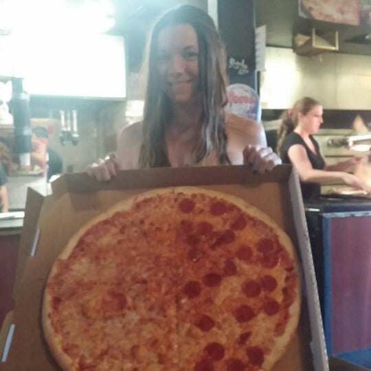 Photo taken at Joe&#39;s New York Pizza by Alexandra P. on 6/9/2014
