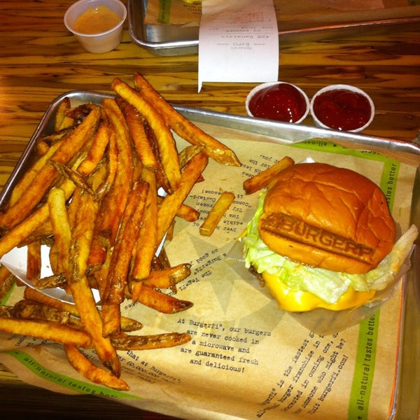 Photo taken at BurgerFi by Nola D. on 2/13/2014
