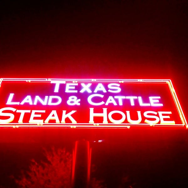 Photo taken at Texas Land &amp; Cattle by Steven T. on 3/9/2013