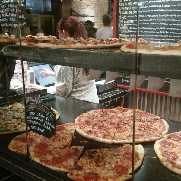 Foto diambil di Lucky Slice Pizza oleh Erik O. pada 12/14/2014
