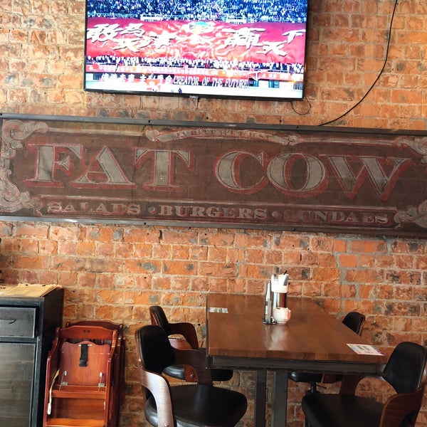 Photo taken at Fat Cow Burgers by Tim G. on 3/31/2018