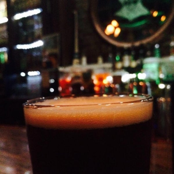 Photo taken at Scruffy Murphy&#39;s Irish Pub by Jake H. on 6/28/2014