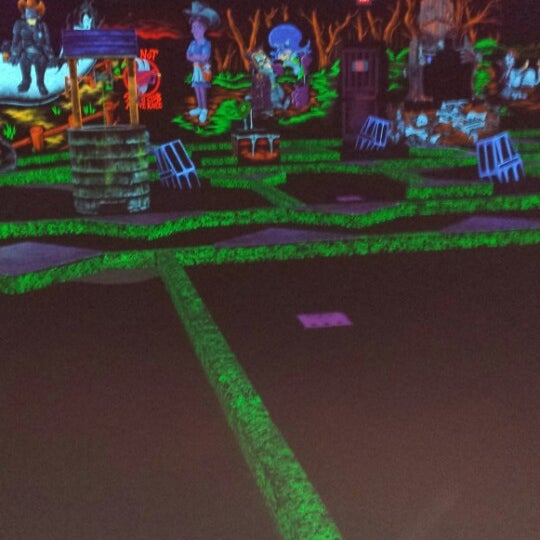 Photo taken at Monster Mini Golf by Priddy on 4/11/2014