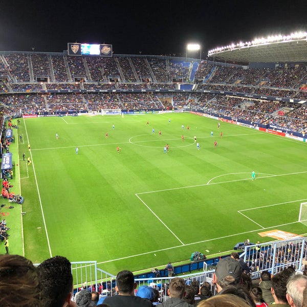 Photo taken at La Rosaleda Stadium by Mohammed F. on 3/10/2018