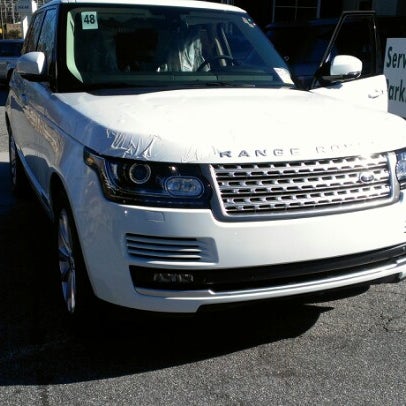 Photo taken at Land Rover Buckhead by Seth E. on 12/21/2012