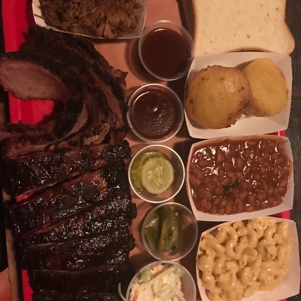 Ribs, pulled pork, brisket with beans, Mac and cheese and cornbread sides