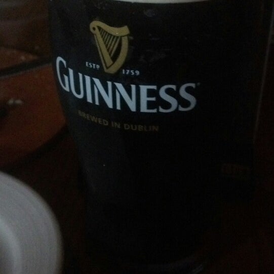 Photo taken at Muldoon&#39;s Irish Pub by Nikki B. on 3/18/2013