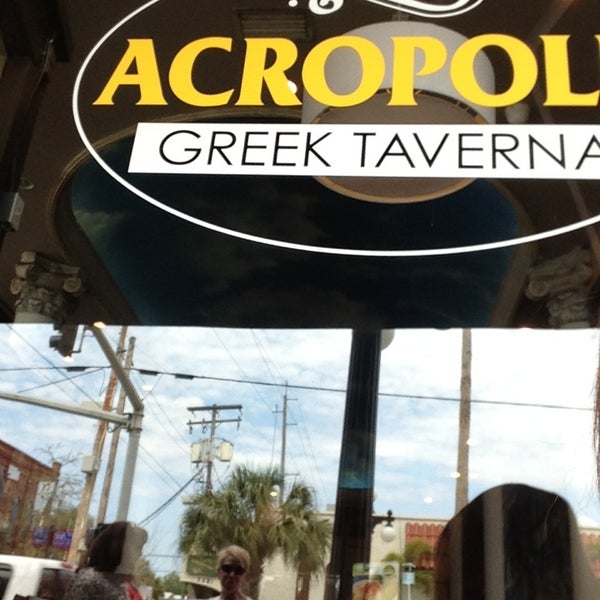 Photo taken at Acropolis Greek Taverna by Kathy S. on 3/22/2013