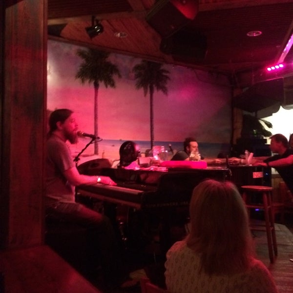 Photo taken at Rum Runners Dueling Piano Bar by Julie E. on 4/27/2014