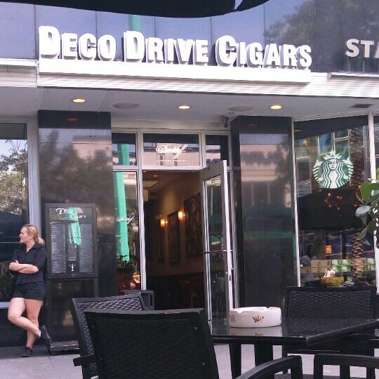 Photo taken at Deco Drive Cigars and Hookah Lounge by Raul on 3/17/2016