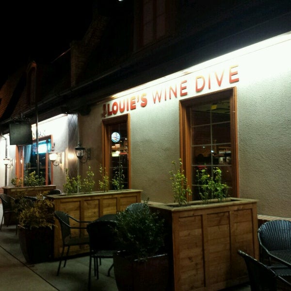 Photo taken at Louie&#39;s Wine Dive by hm h. on 11/6/2016