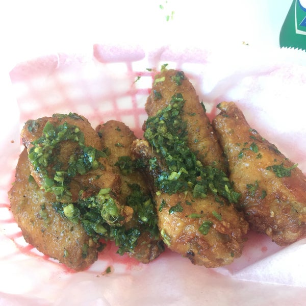 We may not have a Wingstop in the city, but at least we have an awesome mom & pop wings place that serves unique chicken wings (like the Green Wings shown here)