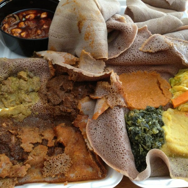 Photo taken at Walia Ethiopian Cuisine by Melissa D. on 8/11/2013