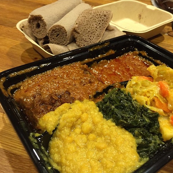 Photo taken at Walia Ethiopian Cuisine by Melissa D. on 2/7/2015