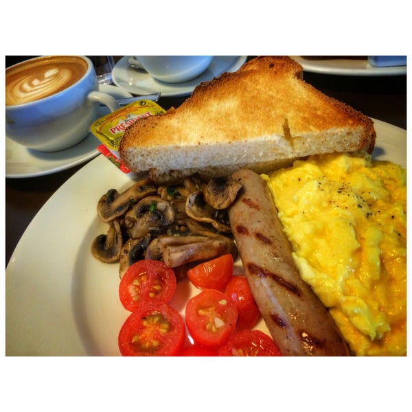 Breakfast plate - toasted fluffy brioche, grilled mushrooms, cherry tomatoes tossed in vinaigrette, and best of all, a heap of creamy buttery scrambled eggs. Best start to your day.